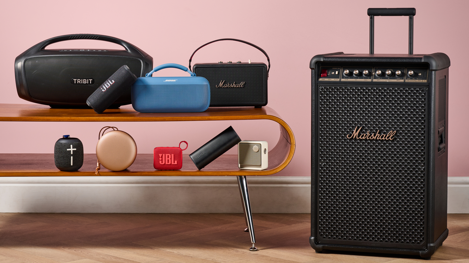 An array of Bluetooth speakers on table