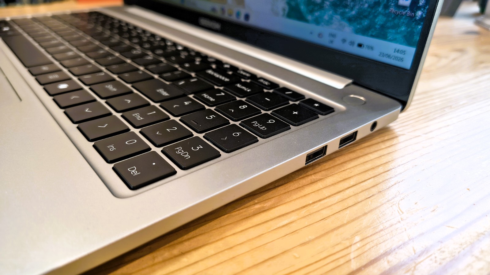 Geekom GeekBook M16 on a desk in a home office during our review